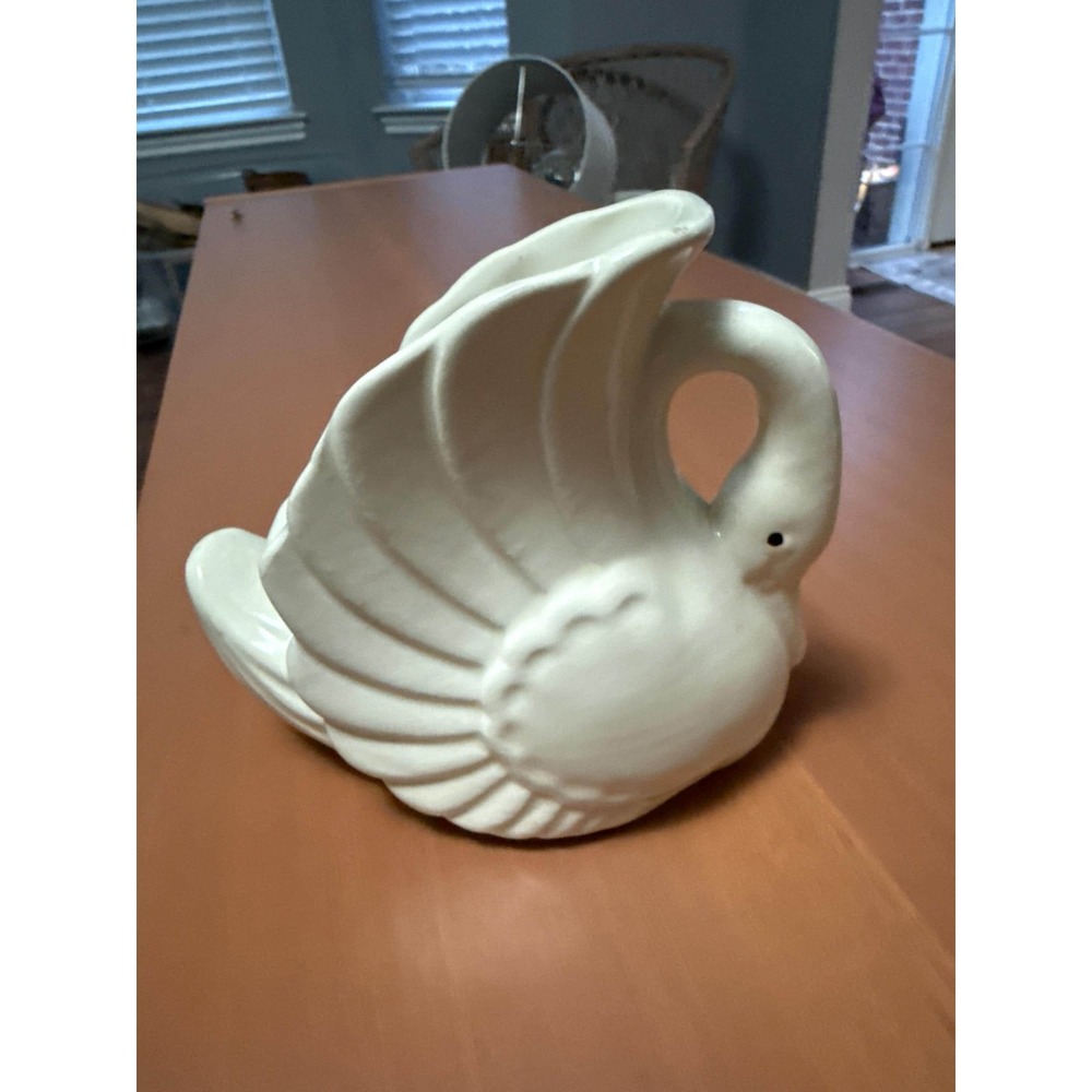 Ceramic swan container